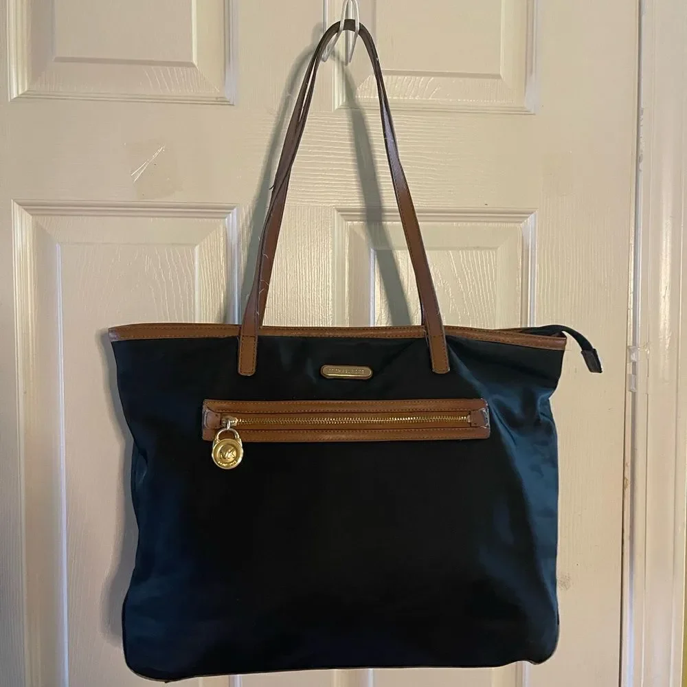 Michael Kors Kempton Nylon Black with Brown Leather traps Tote Bag .
